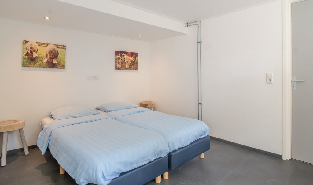 Slaapkamer op de begane grond van Ossenkamp Vakantiehuis